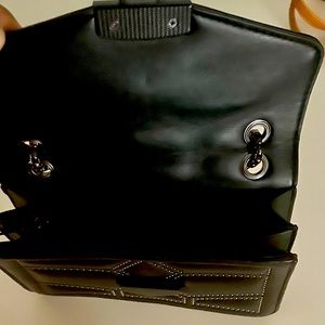 Black with metal circle lined on the outside